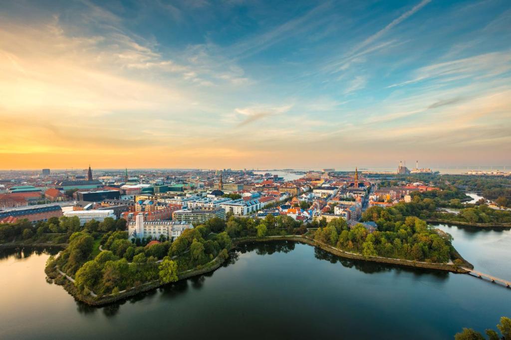 Denmark Signature Journey' itinerary card — Copenhagen, Nyhavn and Tivoli, Denmark — Orchid Vacation