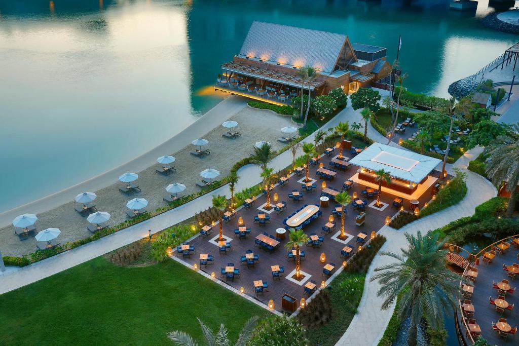 Abu Dhabi Family Vacation Package' itinerary card — Yas Island theme parks, UAE — Orchid Vacation